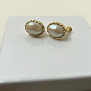 Napier pearl gold tone clip earrings twist trim design